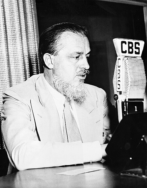 Rex Stout by CBS Radio and photographer uncredited, Public domain, via Wikimedia Commons Rex Stout