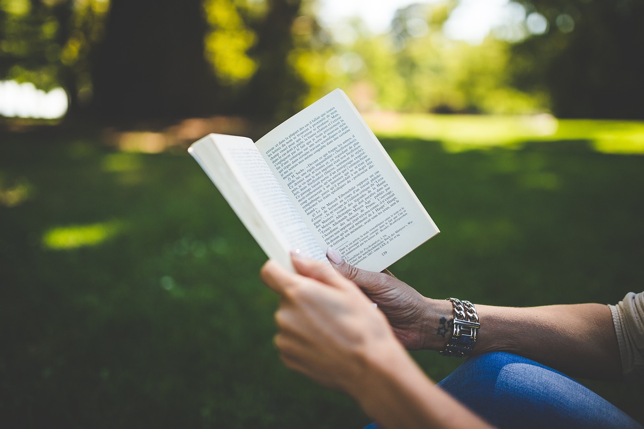 Photo via Pexels/Pixabay Reading outdoors