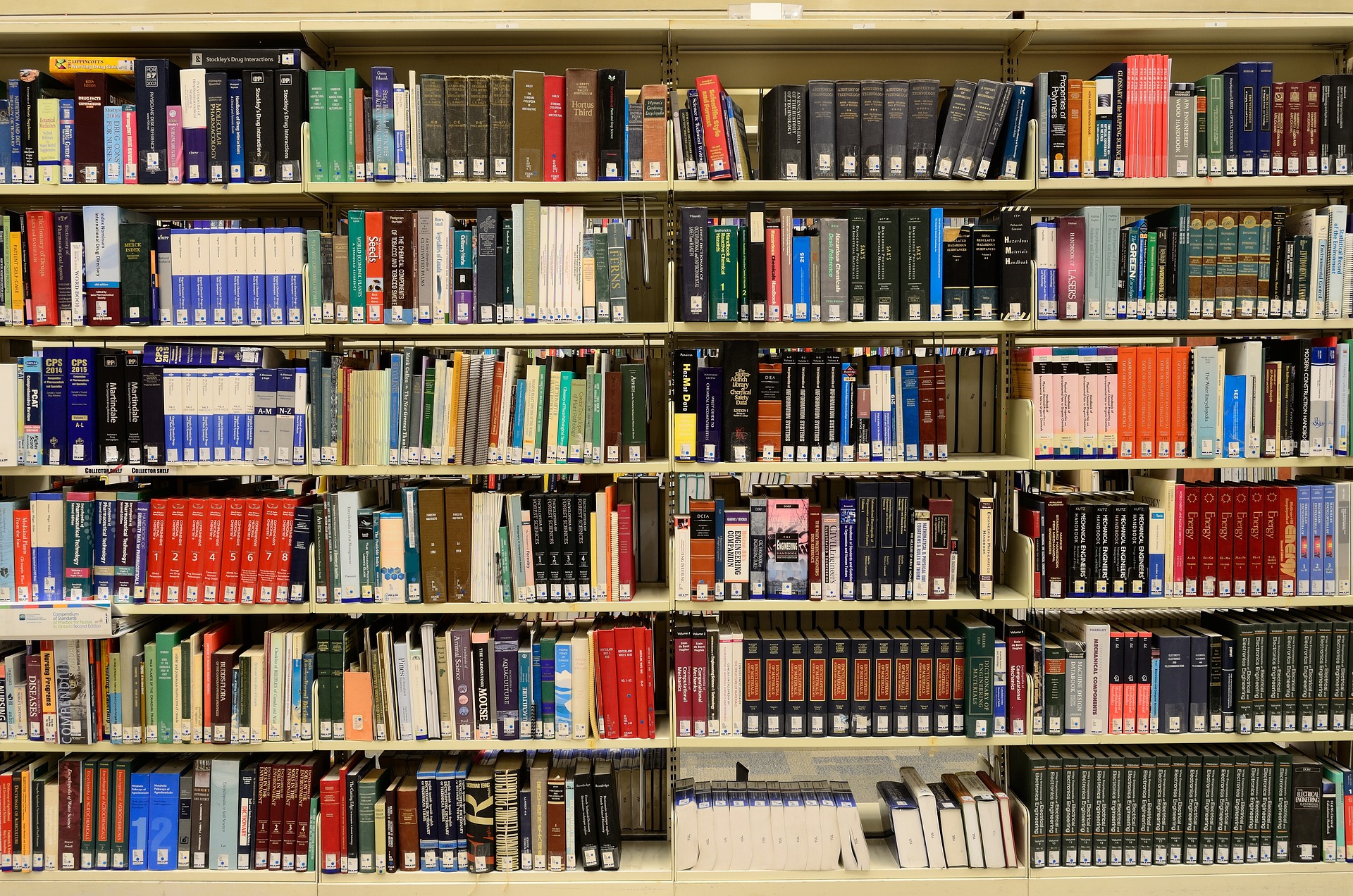 Photo via Pexels/Pixabay Library shelves