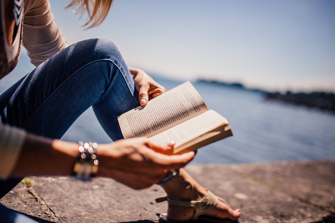 Photo via Pexels/Pixabay Reading a book